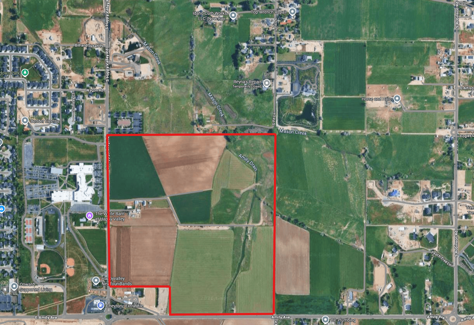 Annotated aerial map showing the proposed 137-acre Toll Brothers development at the northeast corner of E. Amity Ave and S. Happy Valley Rd in Nampa, Idaho.